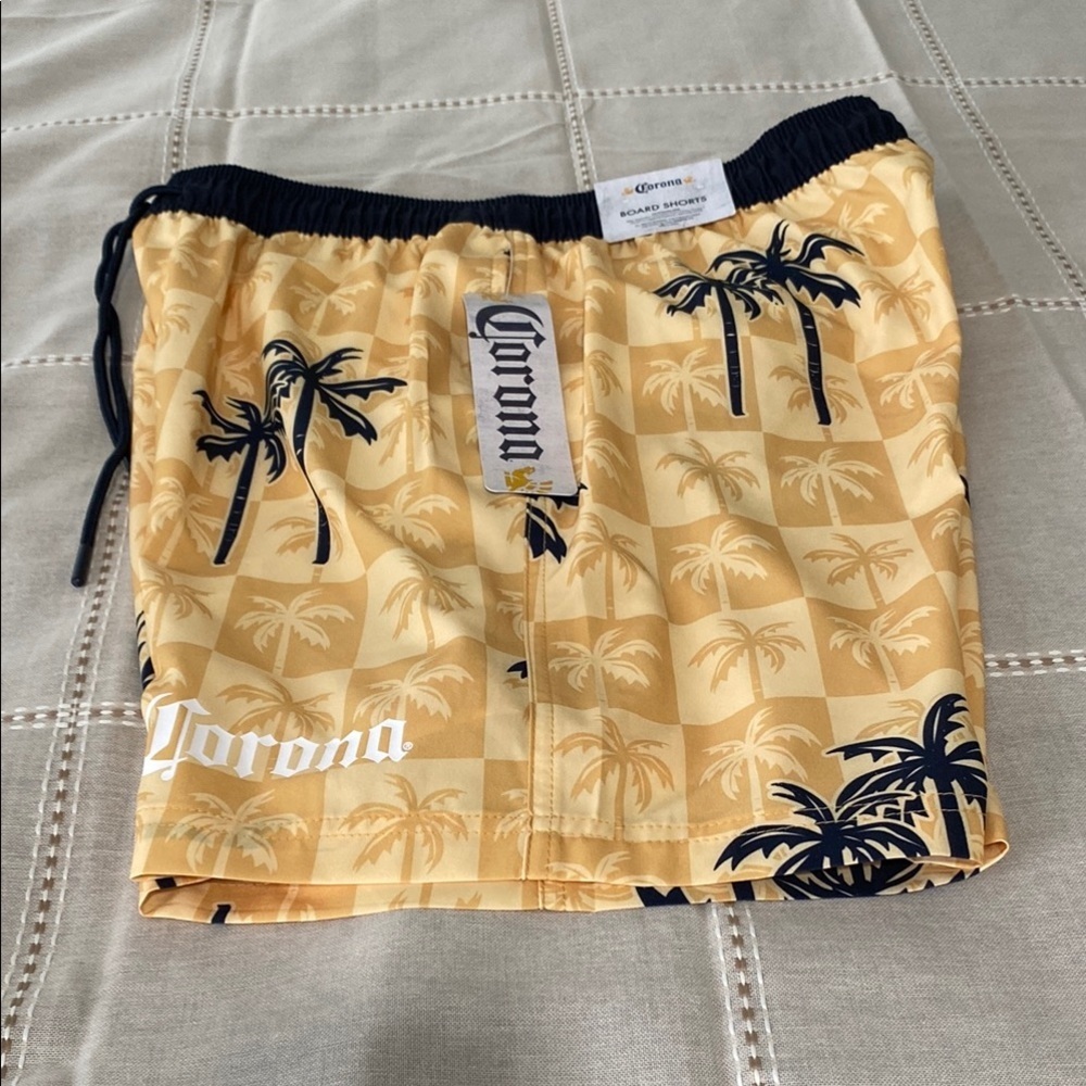 Man Corona Athletic Yellow and Black Shorts with Tropical Design for swim. - Picture 3 of 15